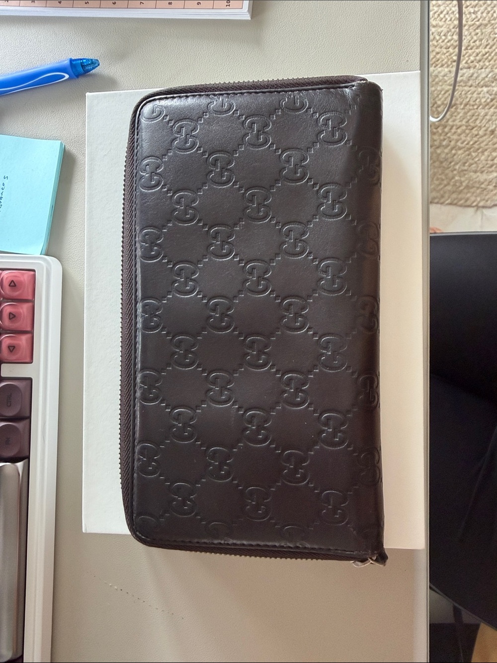Gucci Embossed Leather Zip Around Wallet in Dark Brown